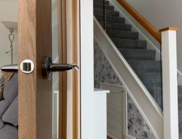 Oak Doors and Glass Staircase